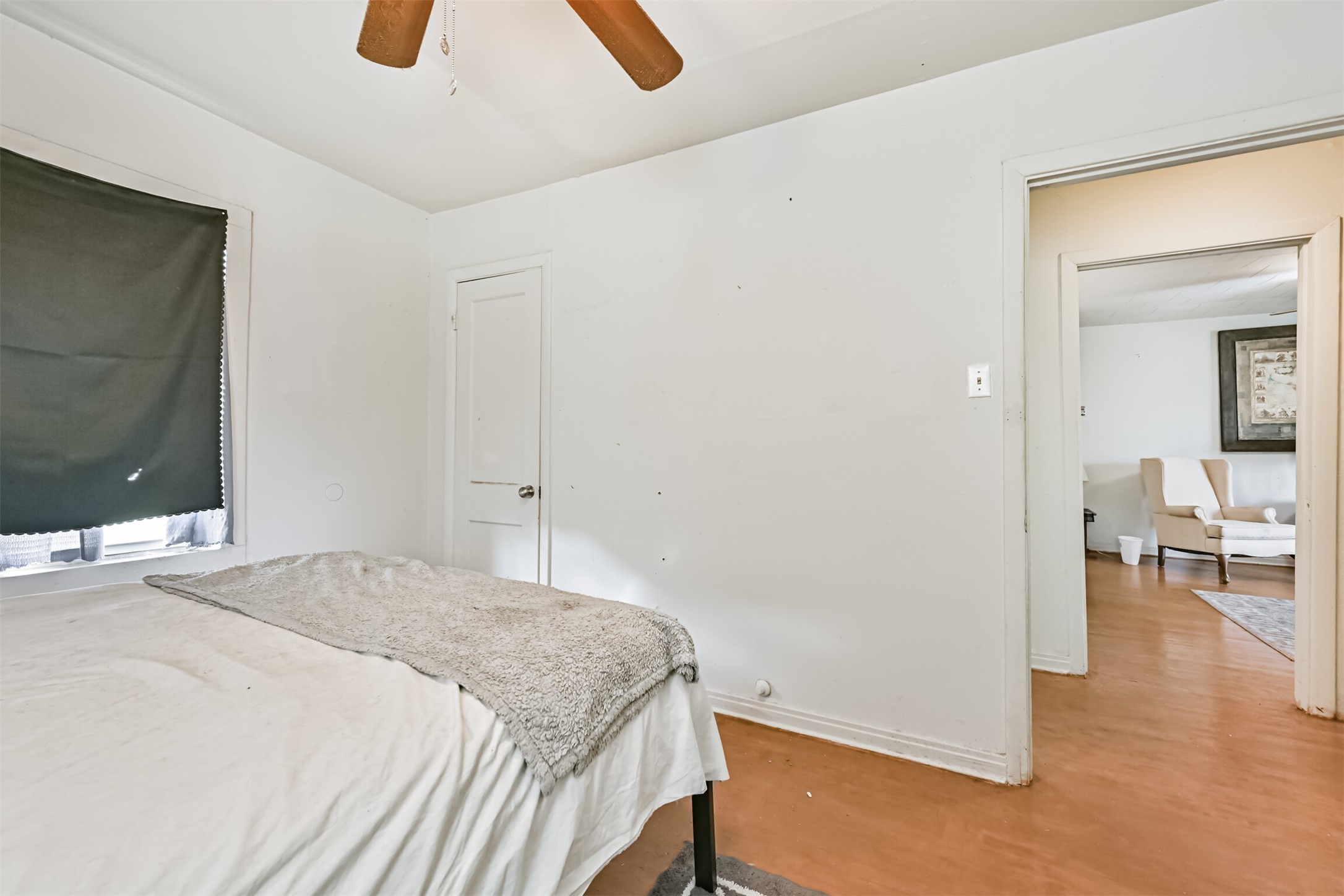 707 West 5th Street Freeport, TX 77541 - Photo 8 of 18 a bedroom with a bed and a flat screen tv