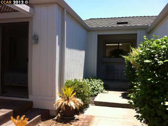 1868 St George Road Danville, CA 94526 - Photo 1 of 1 a potted plant sitting in front of a house