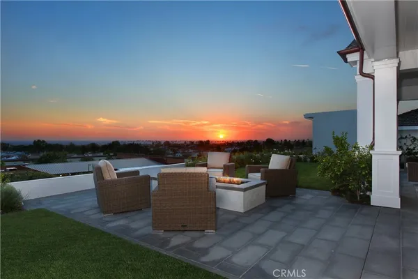 a view of house with outdoor space and patio