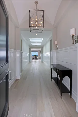 a bedroom with a bed and lamp