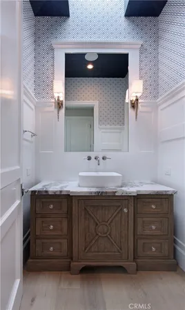 a living room with lots of furniture and a dining table