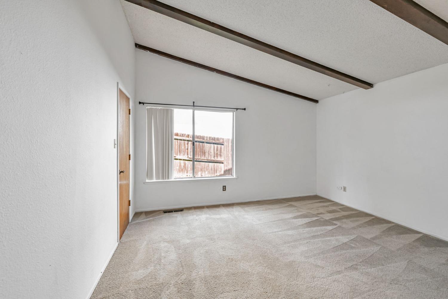 7822 Tamara Drive Fair Oaks, CA 95628 - Photo 9 of 28 an empty room with windows