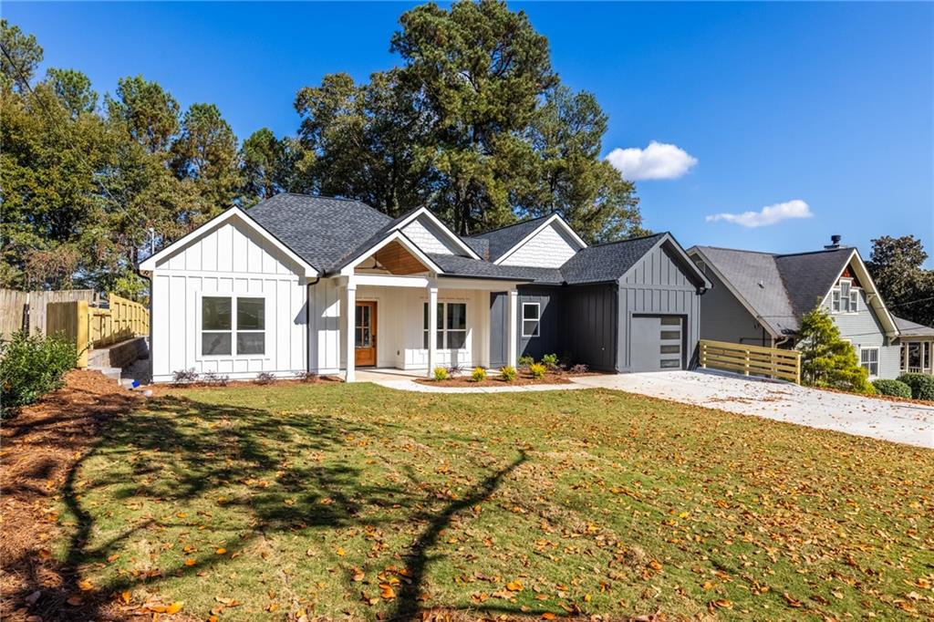 2264 Lawson Way Atlanta, GA 30341 - Photo 1 of 1 a front view of a house with a garden