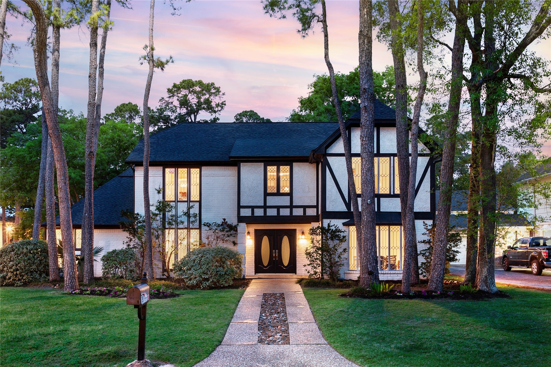 Welcome home to this stunning executive home ideally located in the highly sought-after Champion Forest subdivision