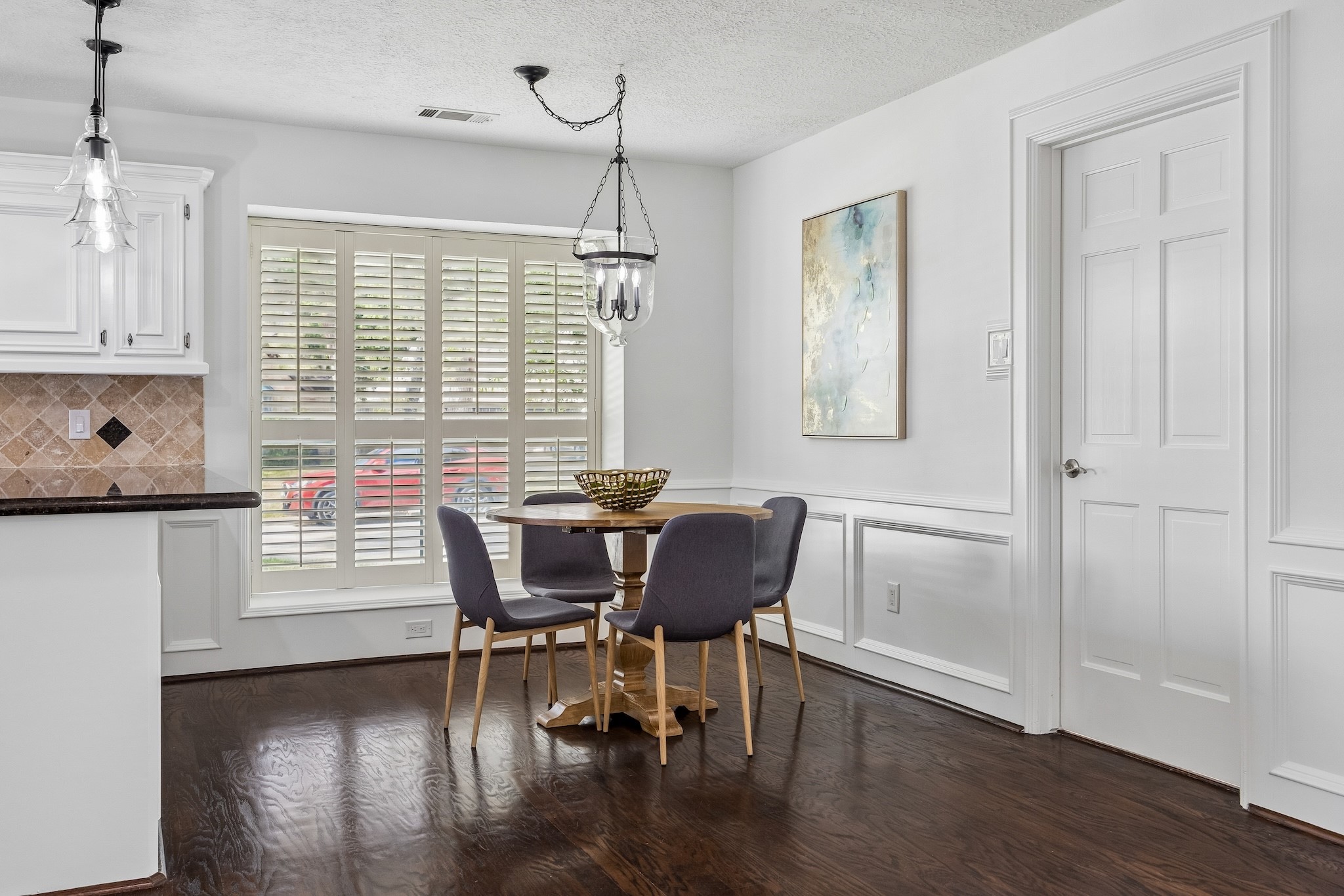 9718 Oxted Lane Spring, TX 77379 - Photo 11 of 38 The nook and kitchen lie adjacent to the family room