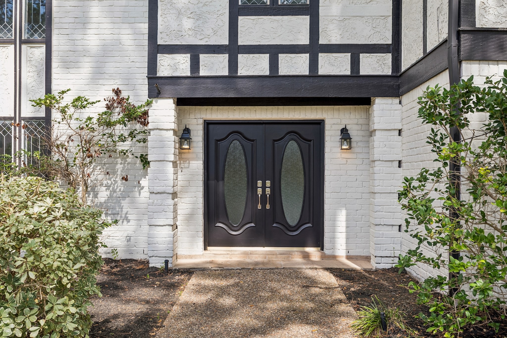 9718 Oxted Lane Spring, TX 77379 - Photo 3 of 38 Grand double door entry with custom Rain Glass affords natural light and privacy