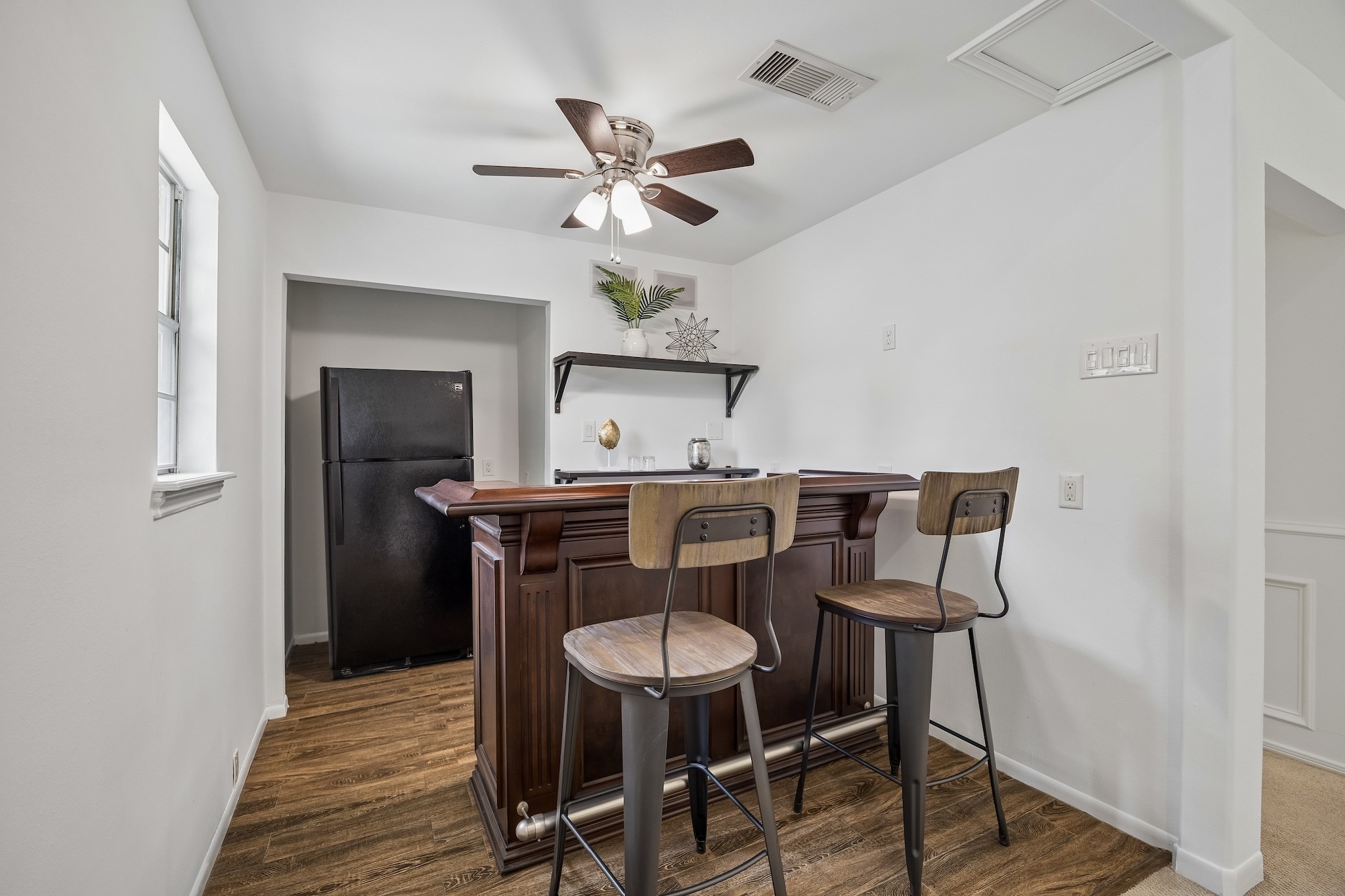 9718 Oxted Lane Spring, TX 77379 - Photo 34 of 38 There is a alcove that's currently set-up to serve as a bar - perfect for serving up drinks and snacks