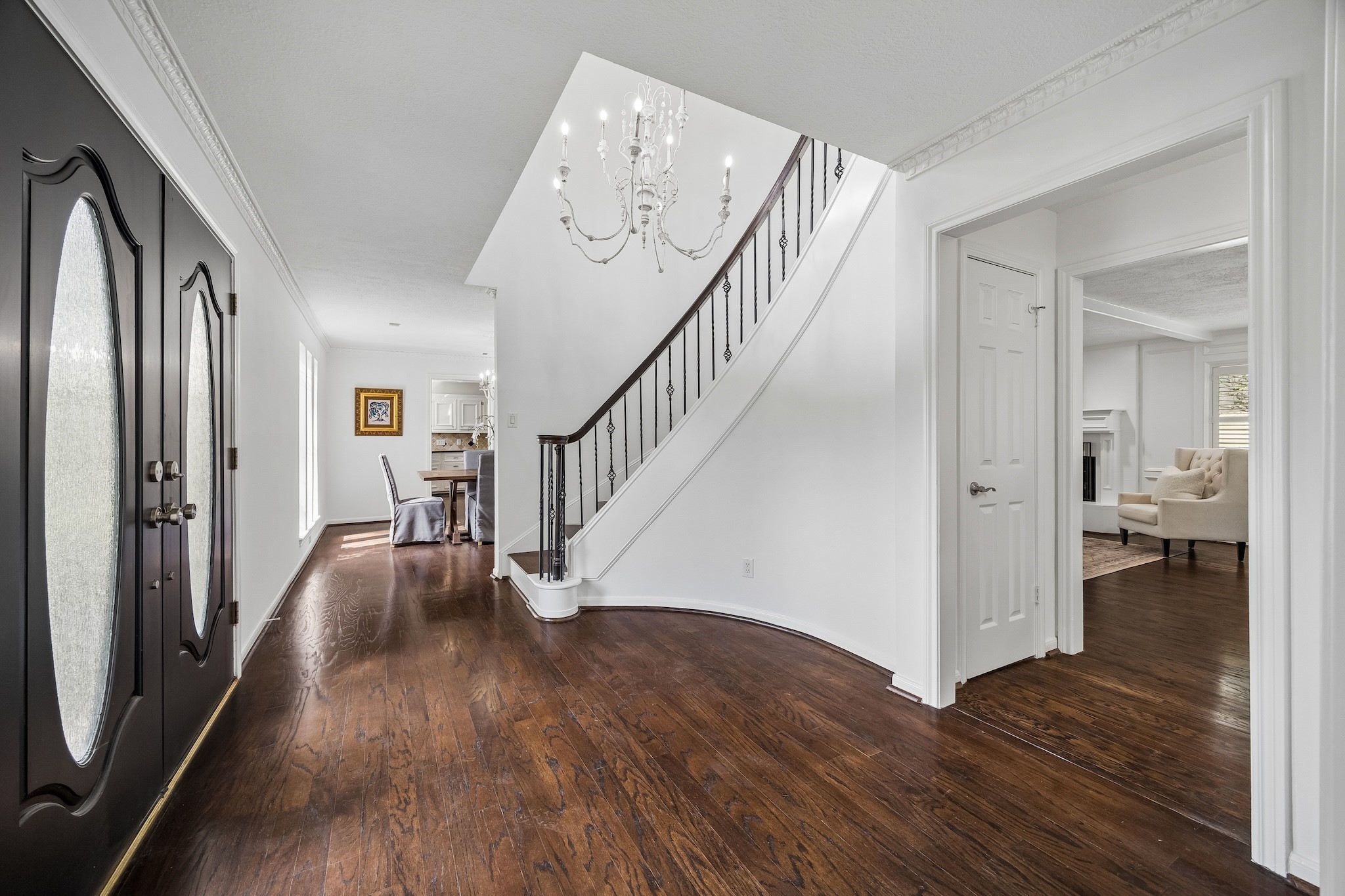 9718 Oxted Lane Spring, TX 77379 - Photo 5 of 38 Fresh whole house Sherwin Williams interior paint in tone on tone white provides a pristine designer canvas