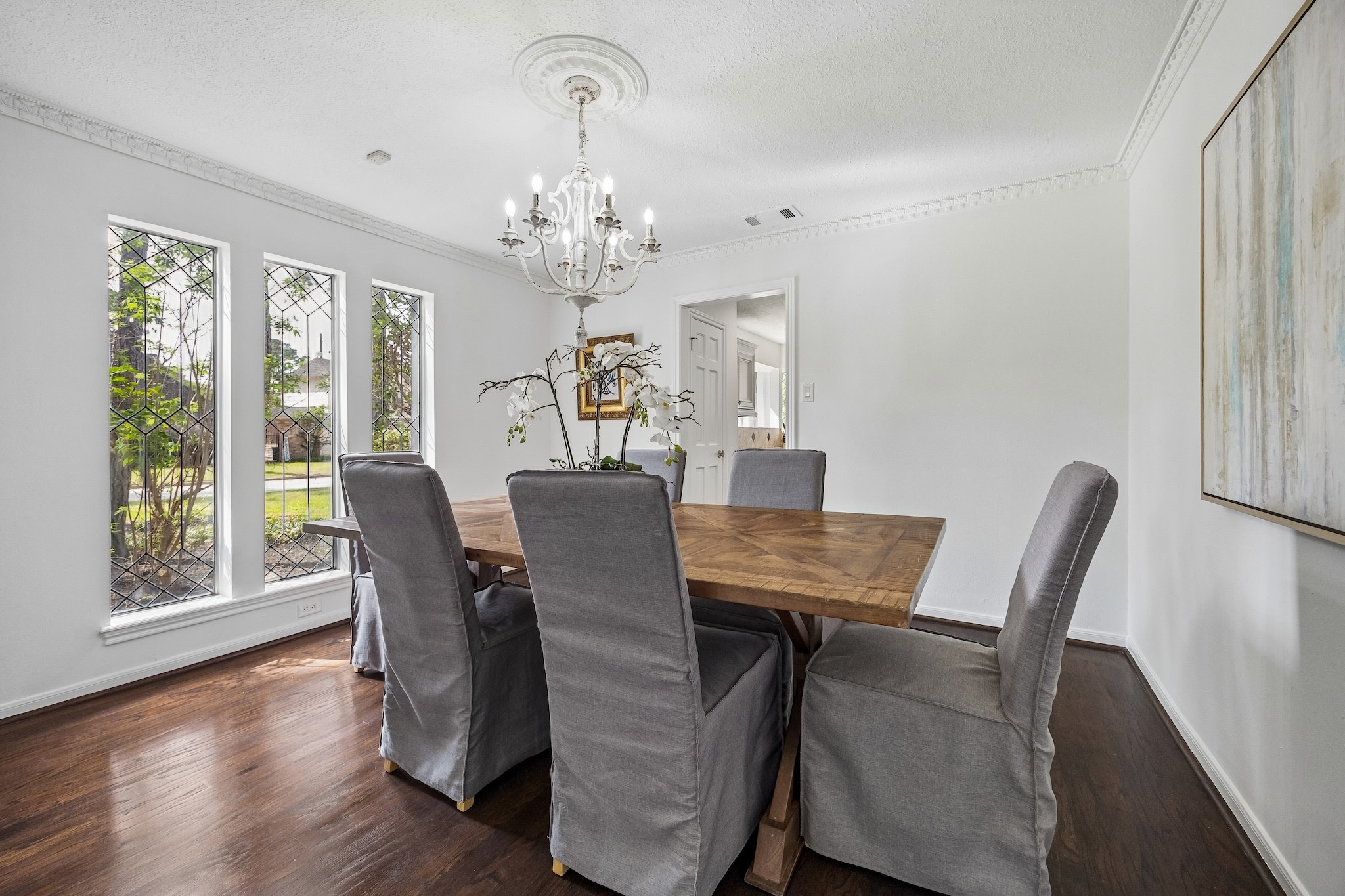 9718 Oxted Lane Spring, TX 77379 - Photo 6 of 38
The well-proportioned dining room has sunlit views of the verdant front yard