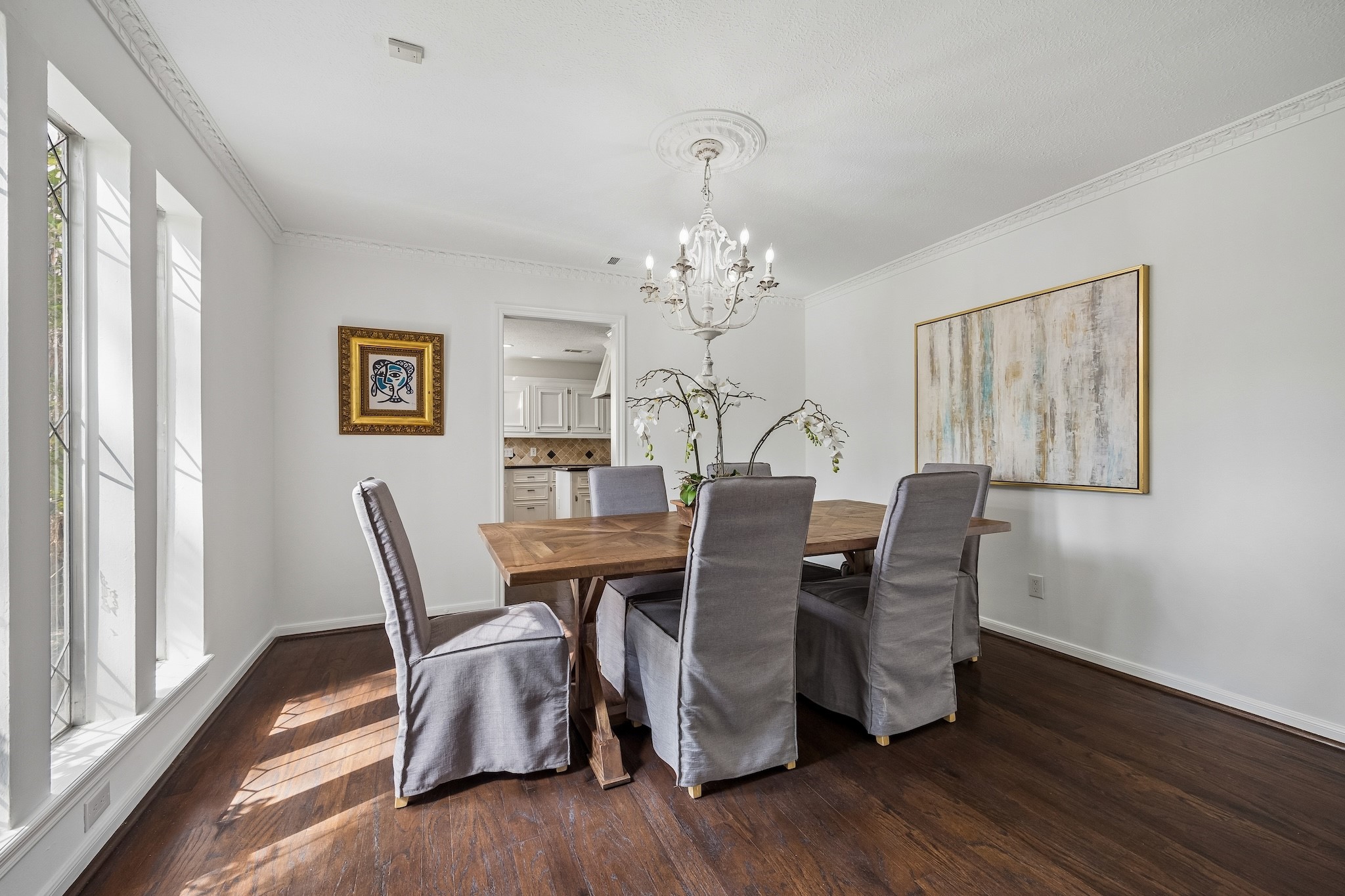 9718 Oxted Lane Spring, TX 77379 - Photo 7 of 38 Perfect for entertaining, the dining room flows right into the kitchen