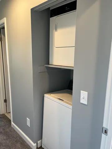 a bathroom with a shower and toilet