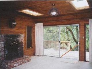 Mountain View Road Forest Knolls, CA 94933 - Photo 3 of 5 a view of a room with a bed and balcony
