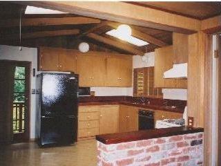 Mountain View Road Forest Knolls, CA 94933 - Photo 4 of 5 a kitchen with stainless steel appliances granite countertop a refrigerator and a stove