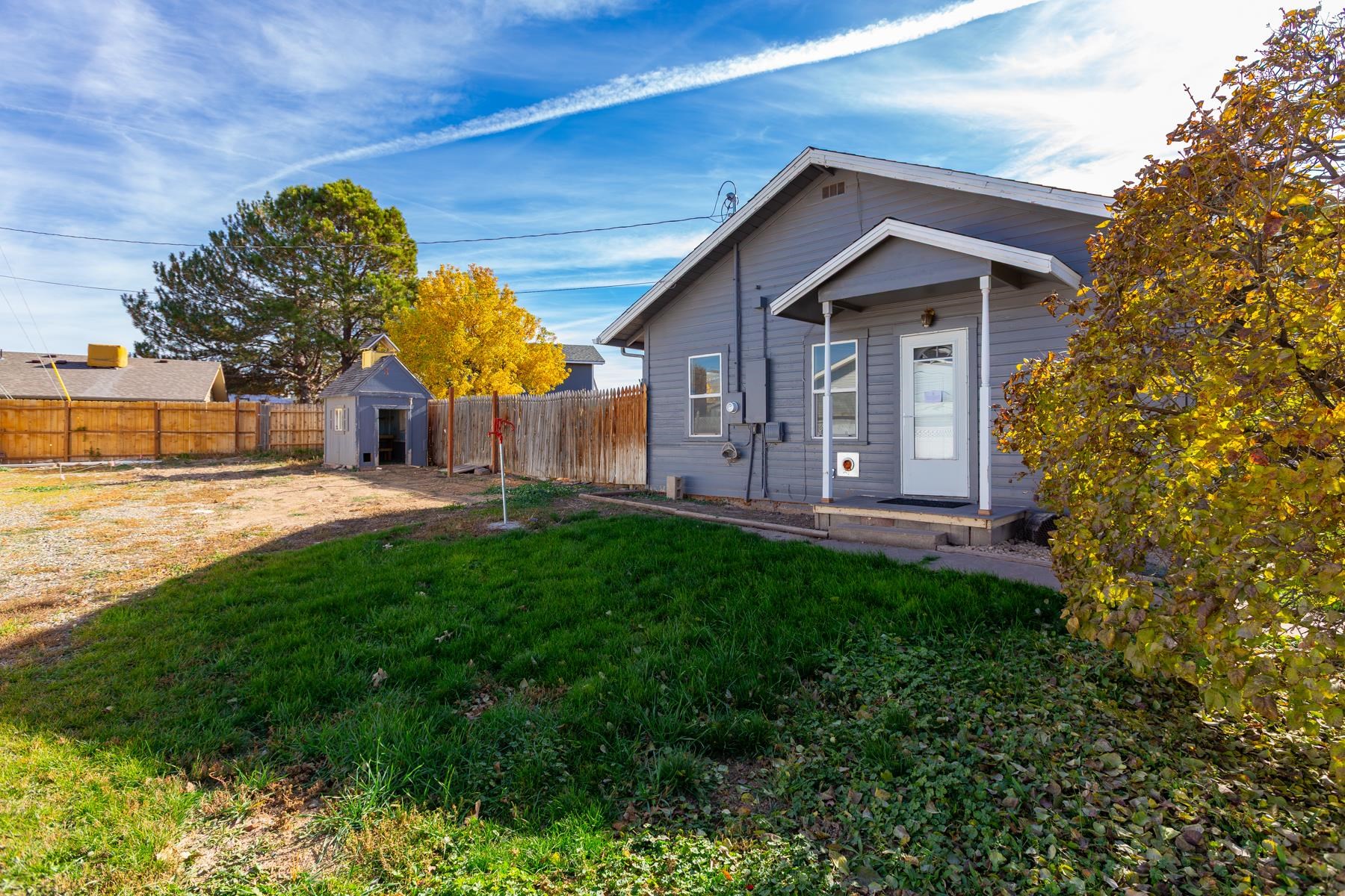 431 Pleasant Ridge Lane, Unit B Grand Junction, CO 81507 - Photo 1 of 20 a front view of house with a garden
