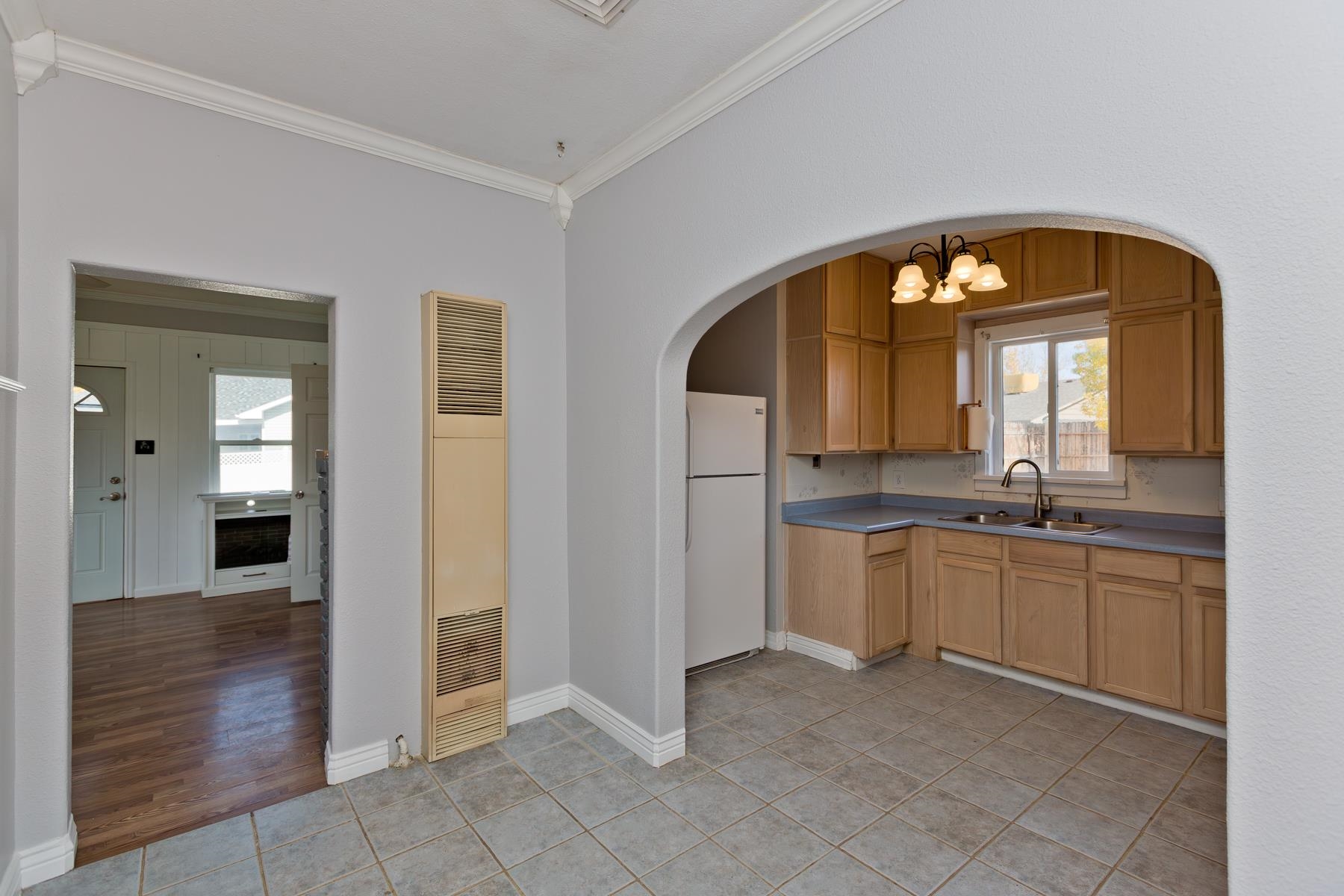 431 Pleasant Ridge Lane, Unit B Grand Junction, CO 81507 - Photo 13 of 20 a large en suite bathroom with a granite countertop sink and a mirror