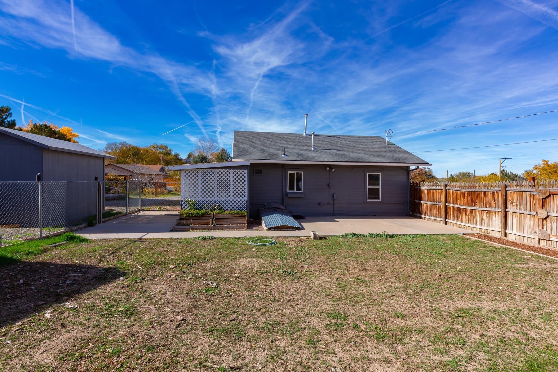 431 Pleasant Ridge Lane, Unit B Grand Junction, CO 81507 - Photo 3 of 20 a house view with a garden space