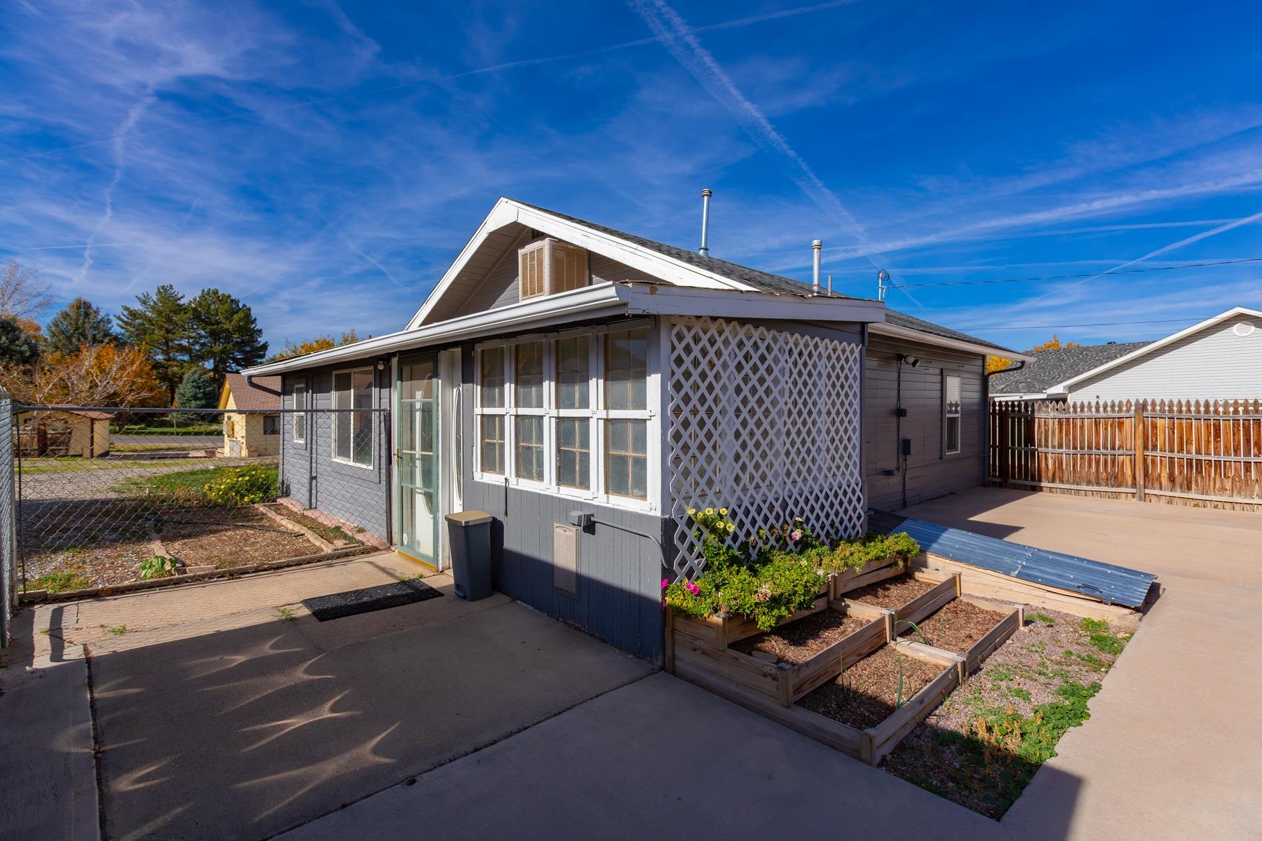 431 Pleasant Ridge Lane, Unit B Grand Junction, CO 81507 - Photo 5 of 20 a front view of a house with a yard