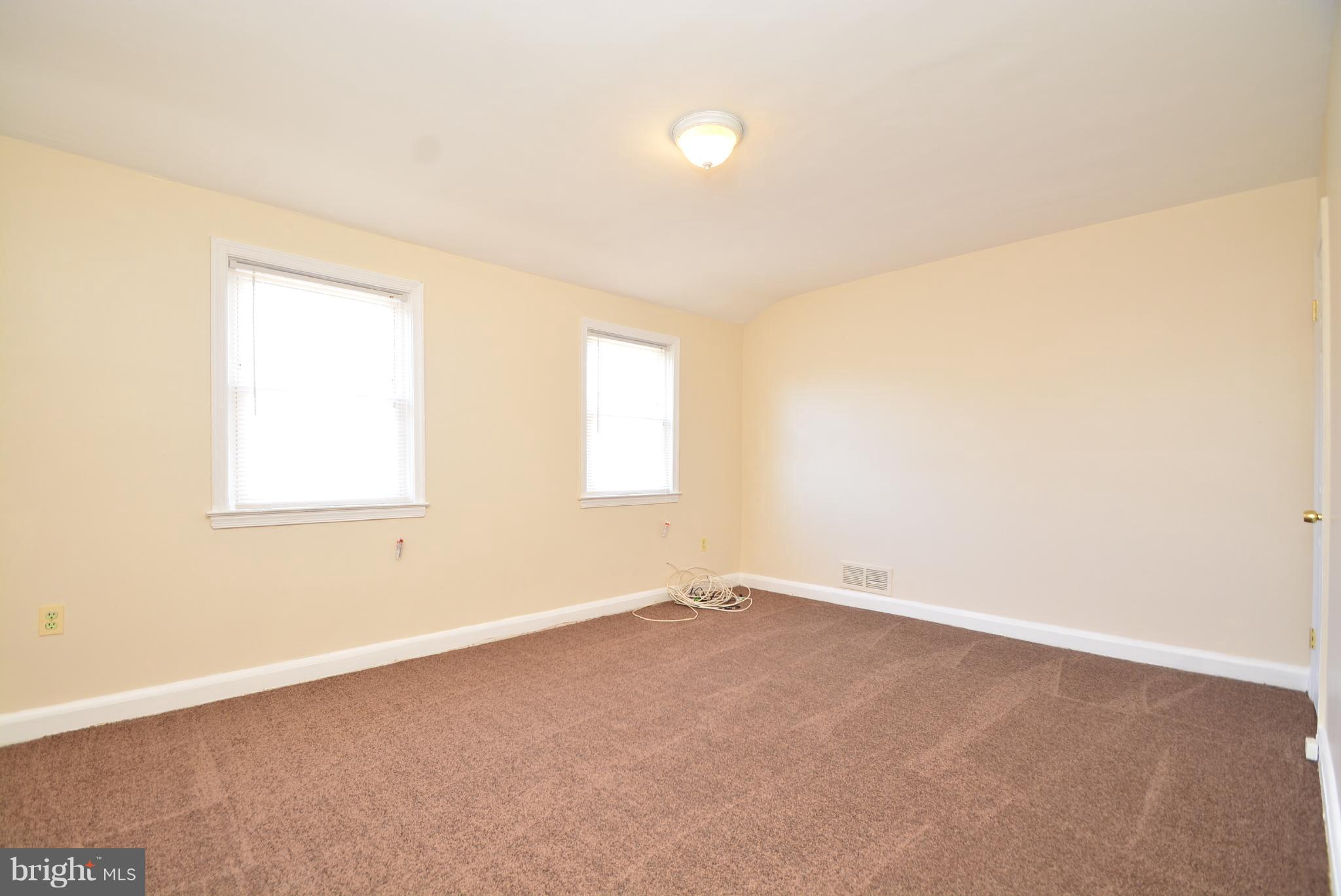 1947 Quentin Road Baltimore, MD 21222 - Photo 13 of 20 an empty room with a window