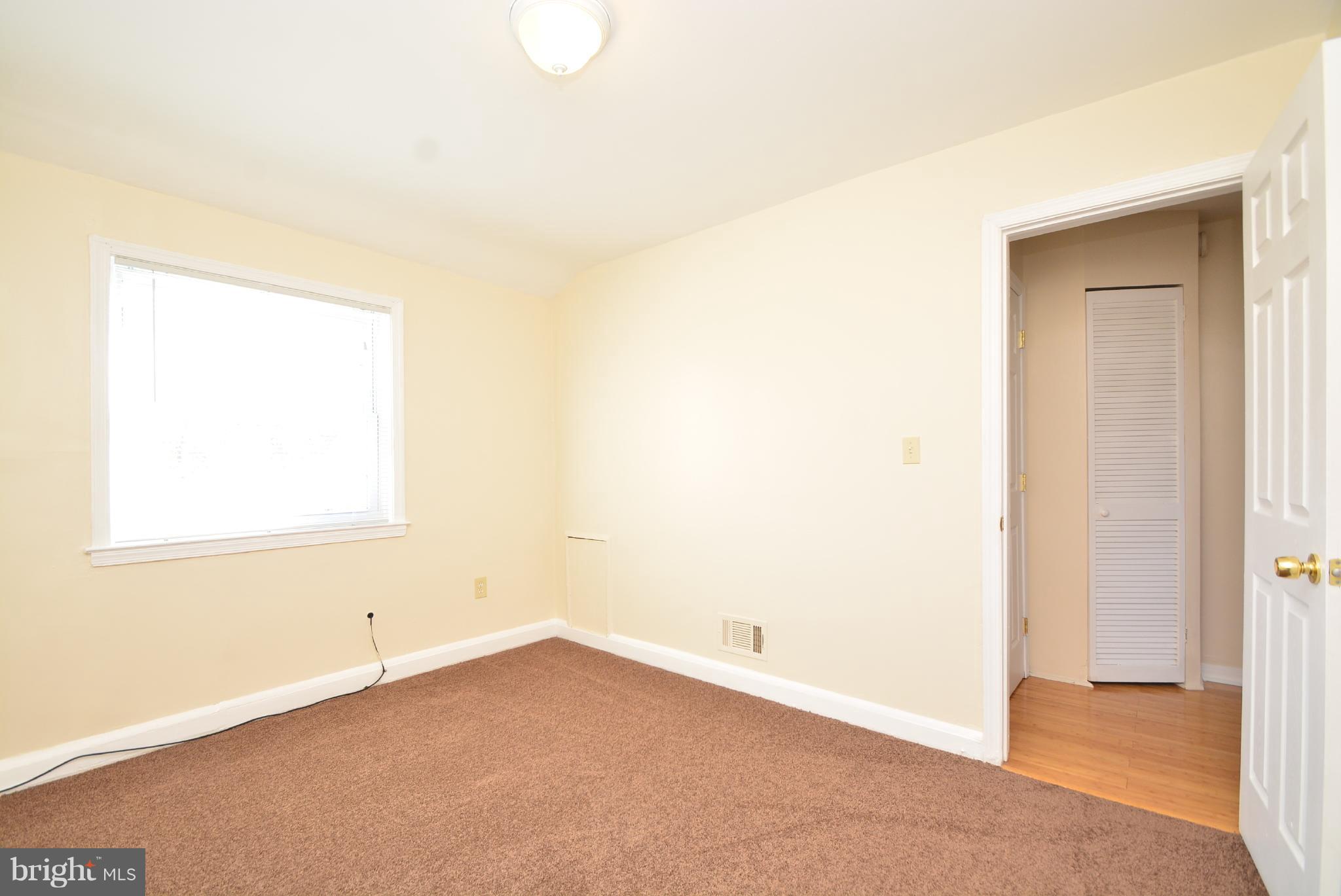 1947 Quentin Road Baltimore, MD 21222 - Photo 9 of 20 an empty room with a window