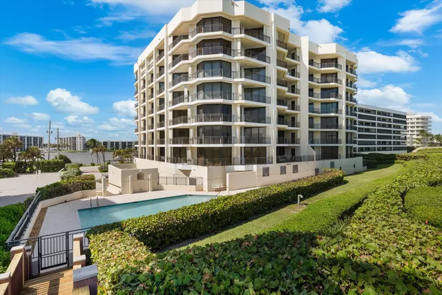 a view of swimming pool with a terrace seating area