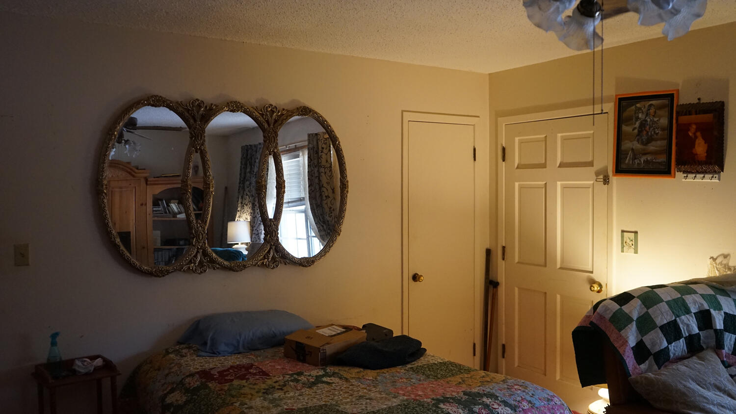 4217 Audiss Road Milton, FL 32583 - Photo 25 of 27 a bedroom with a bed and cabinets