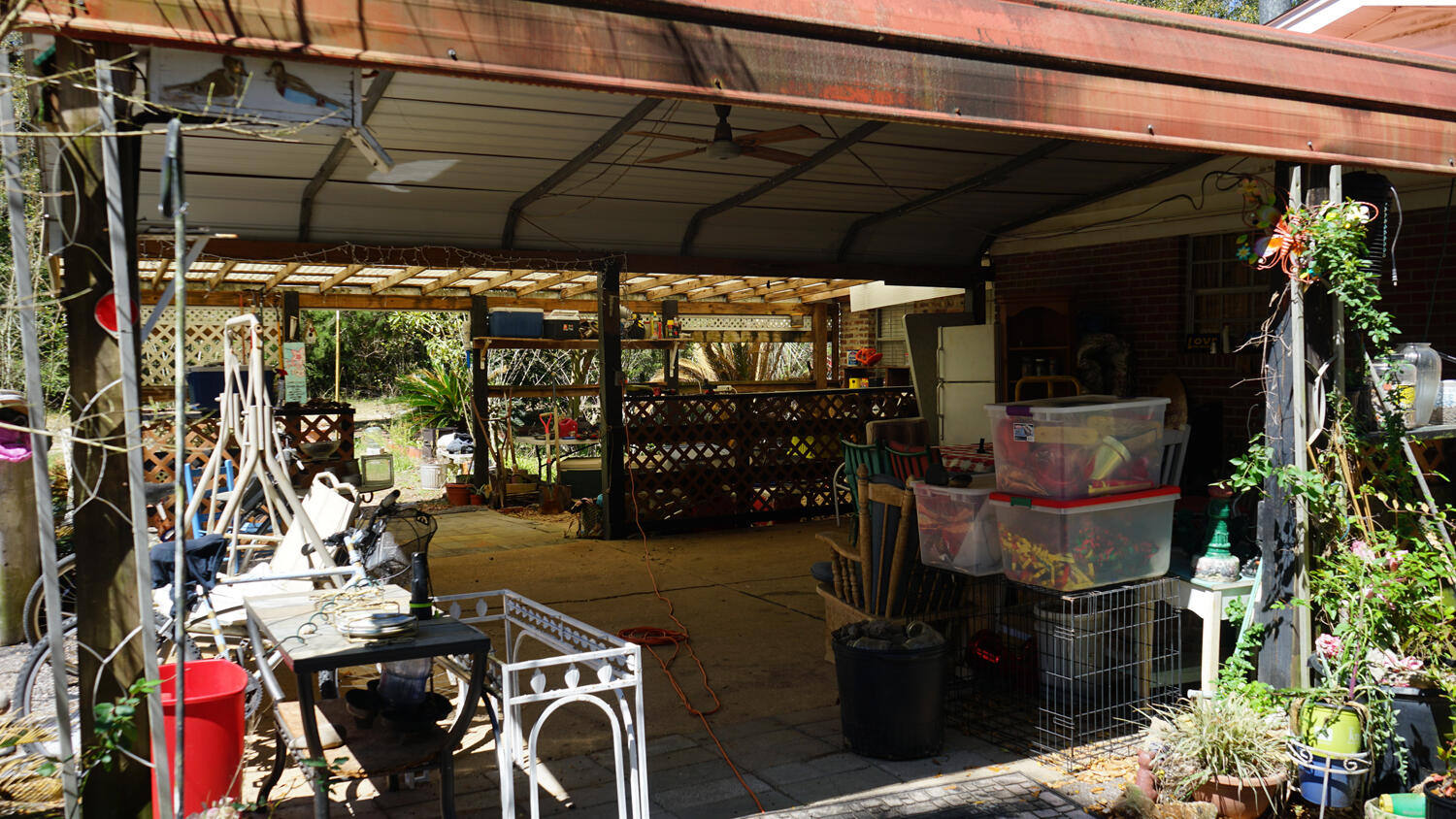 4217 Audiss Road Milton, FL 32583 - Photo 7 of 27 a view of a chairs and tables in patio