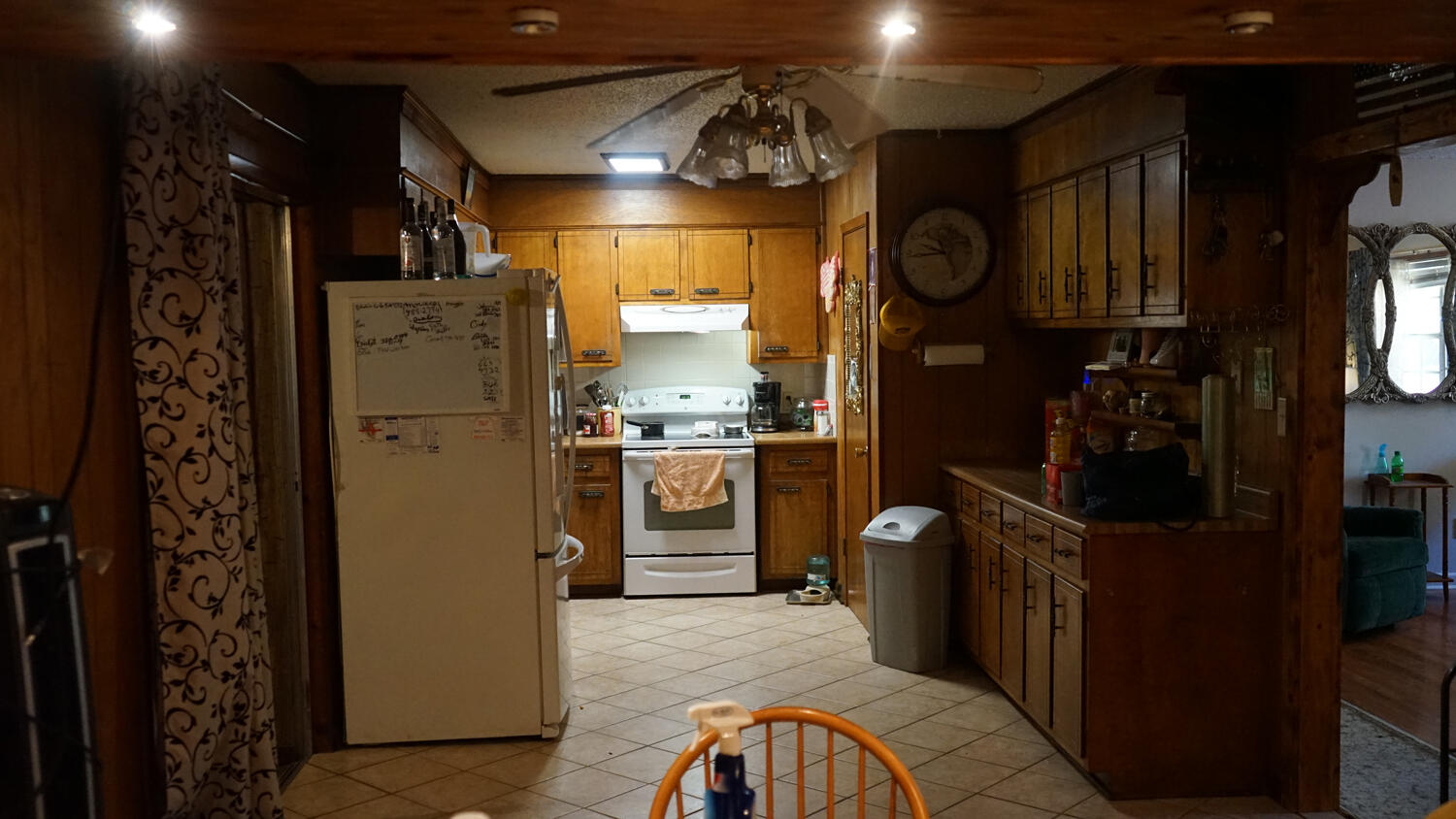 4217 Audiss Road Milton, FL 32583 - Photo 10 of 27 a kitchen that has a refrigerator and a stove