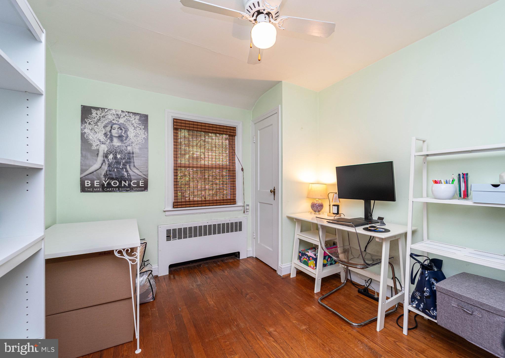 3914 Rexmere Road Baltimore, MD 21218 - Photo 23 of 29 a view of a livingroom with workspace and a window