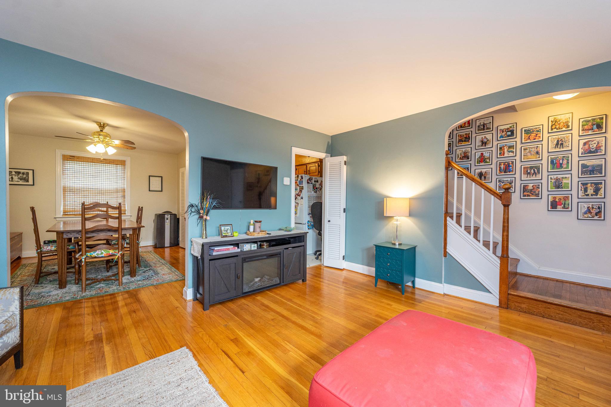 3914 Rexmere Road Baltimore, MD 21218 - Photo 6 of 29 a living room with furniture and a flat screen tv