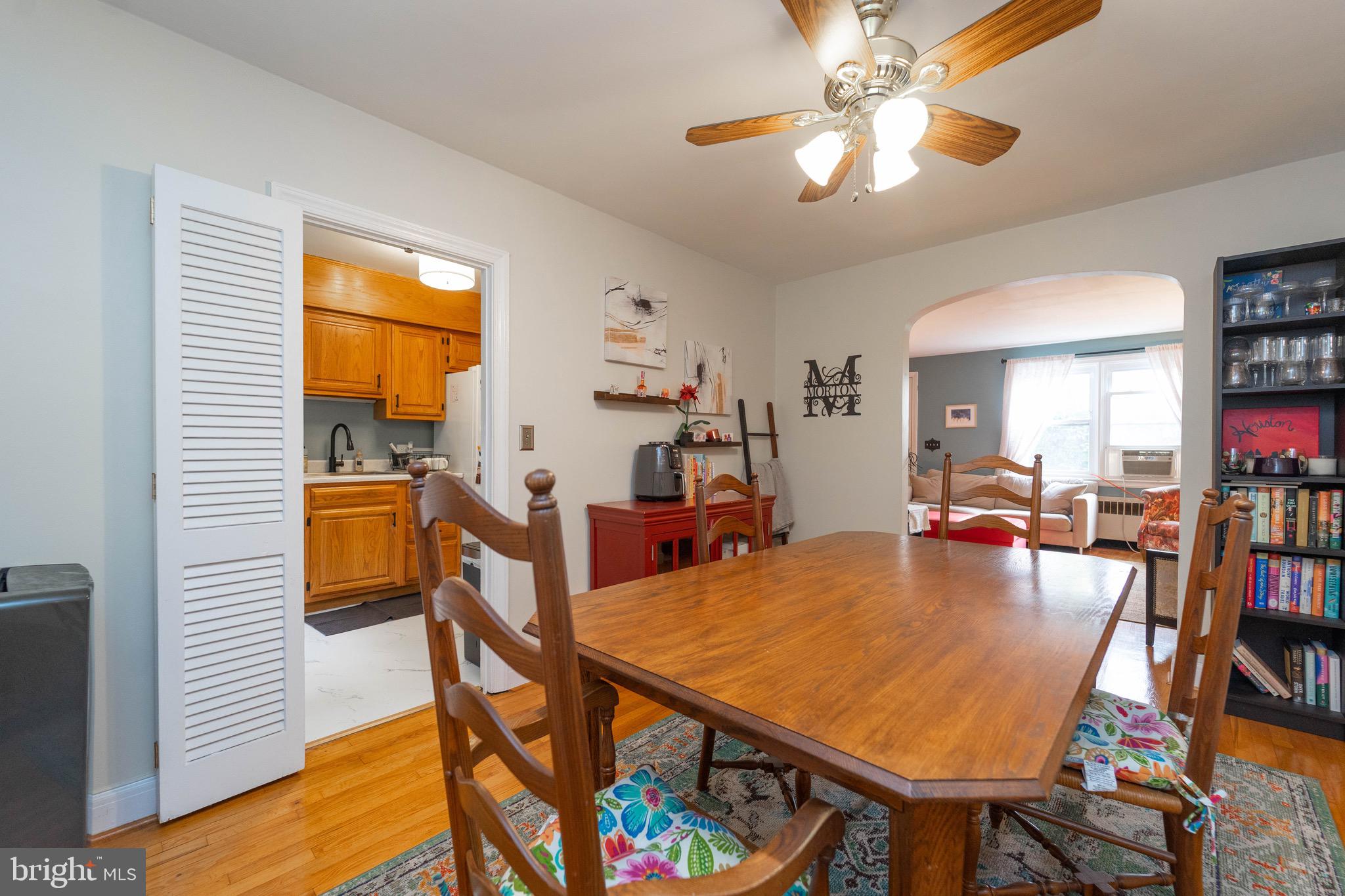 3914 Rexmere Road Baltimore, MD 21218 - Photo 8 of 29 a view of a dining room with furniture and a window