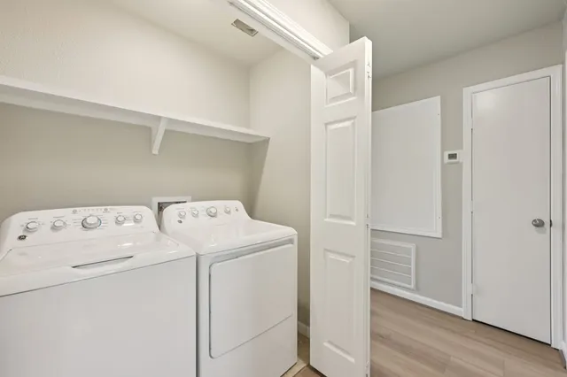 a utility room with dryer and washer