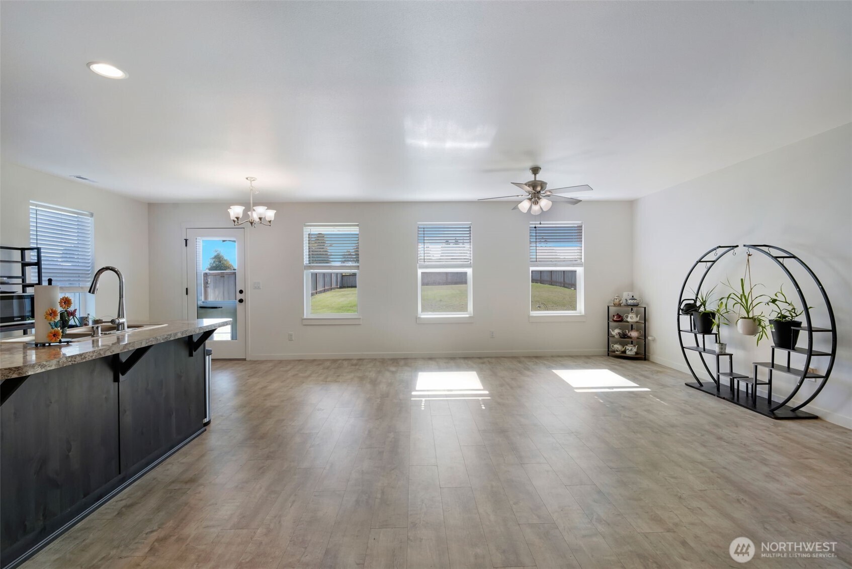 602 Cardinal Avenue Winlock, WA 98596 - Photo 11 of 24 a view of a livingroom with furniture wooden floor and a window