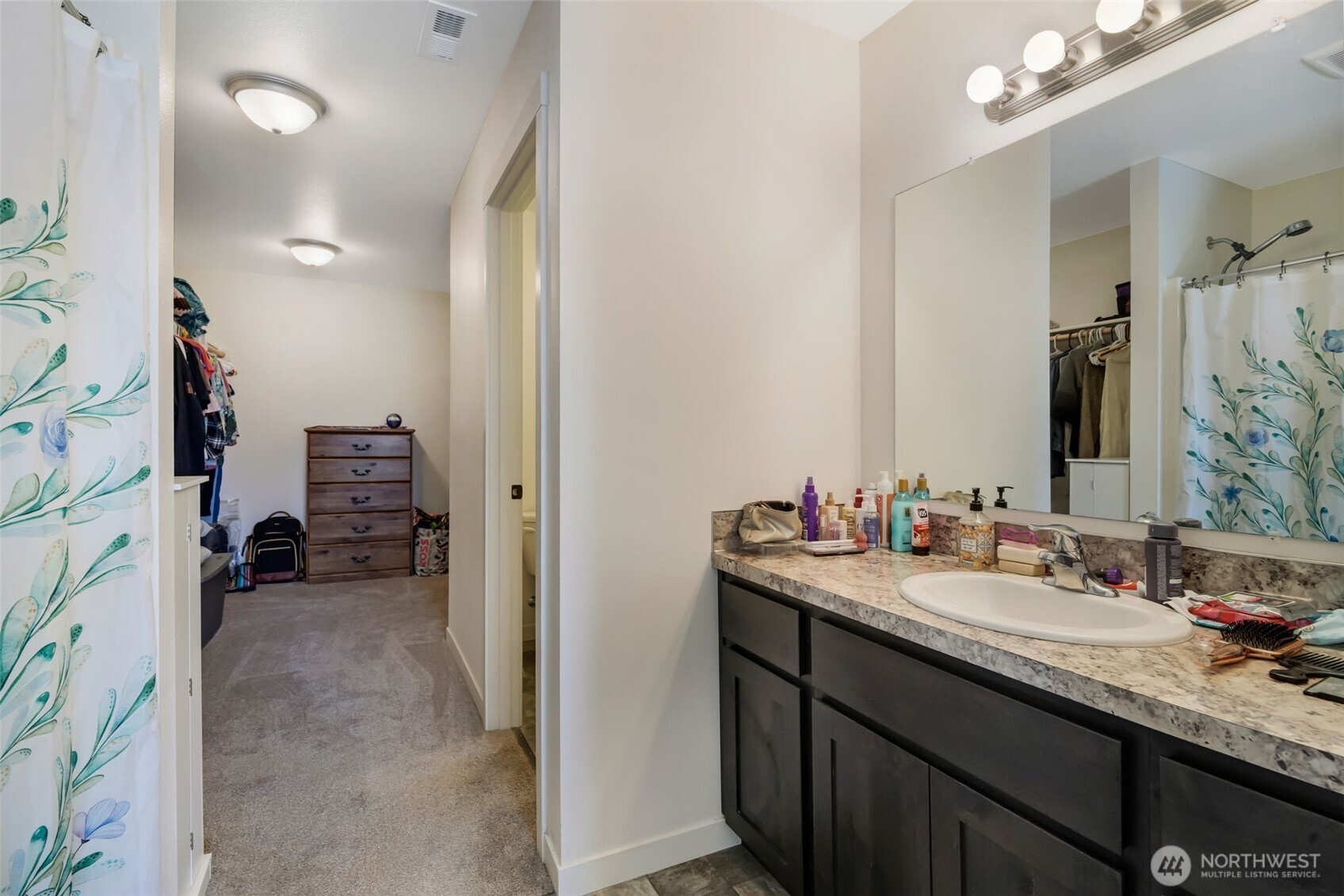 602 Cardinal Avenue Winlock, WA 98596 - Photo 17 of 24 a en suite bathroom with a sink double vanity and a mirror