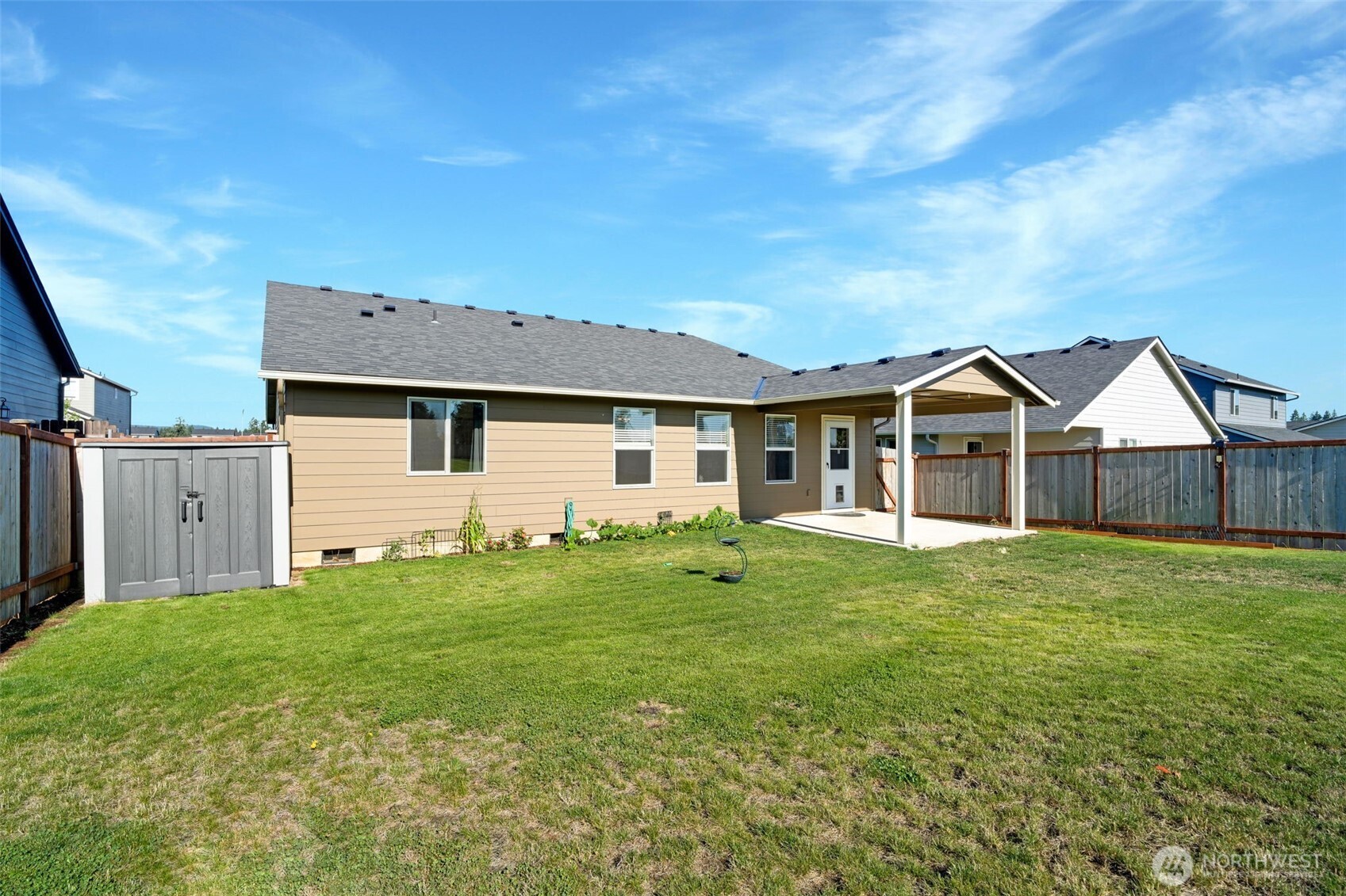 602 Cardinal Avenue Winlock, WA 98596 - Photo 20 of 24 a front view of a house with a yard