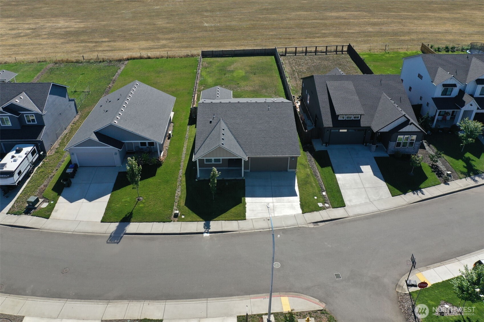 602 Cardinal Avenue Winlock, WA 98596 - Photo 22 of 24 an aerial view of a house with lake view and a yard