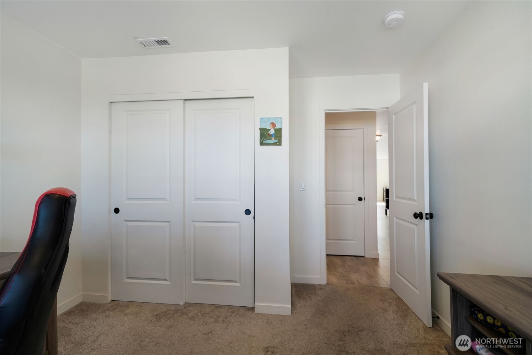 602 Cardinal Avenue Winlock, WA 98596 - Photo 5 of 24 a view of a hallway with closet area