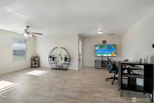 a view of a livingroom with furniture and chandelier