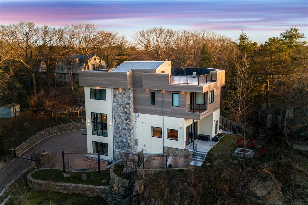 71 Grove Street Brookline, MA 02467 - Photo 2 of 42 a aerial view of a house