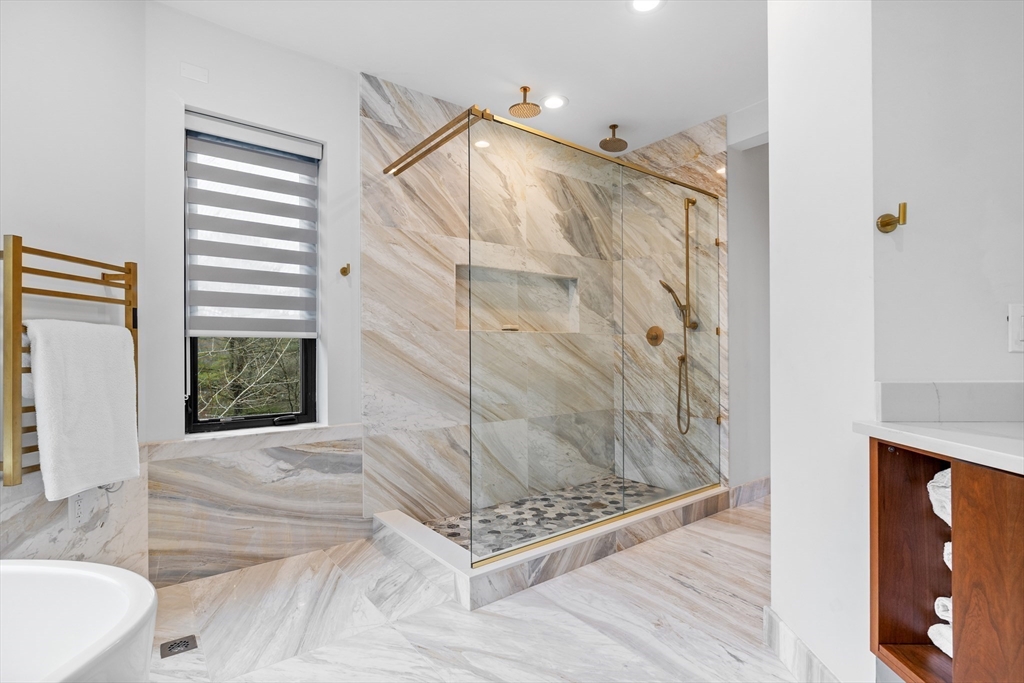 71 Grove Street Brookline, MA 02467 - Photo 27 of 42 a bathroom with a shower