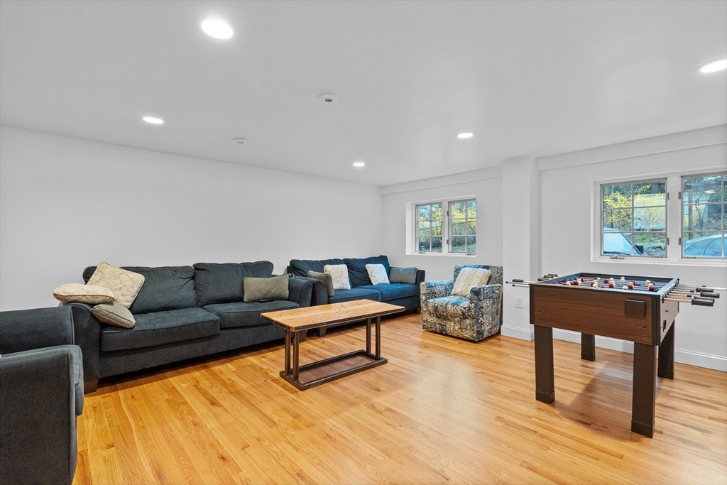 71 Grove Street Brookline, MA 02467 - Photo 38 of 42 a living room with furniture and wooden floor
