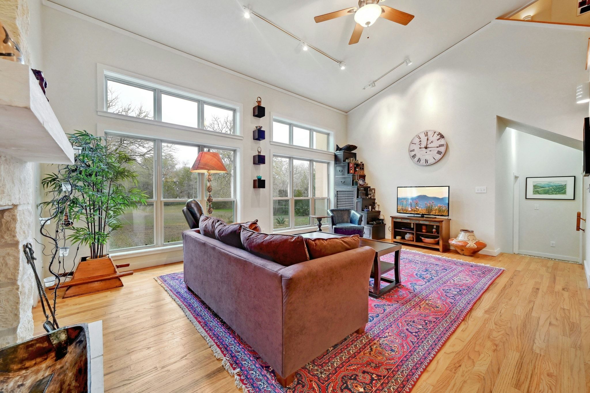 2147 Tejas Trail Blanco, TX 78606 - Photo 6 of 29 a living room with furniture large window and flat screen tv