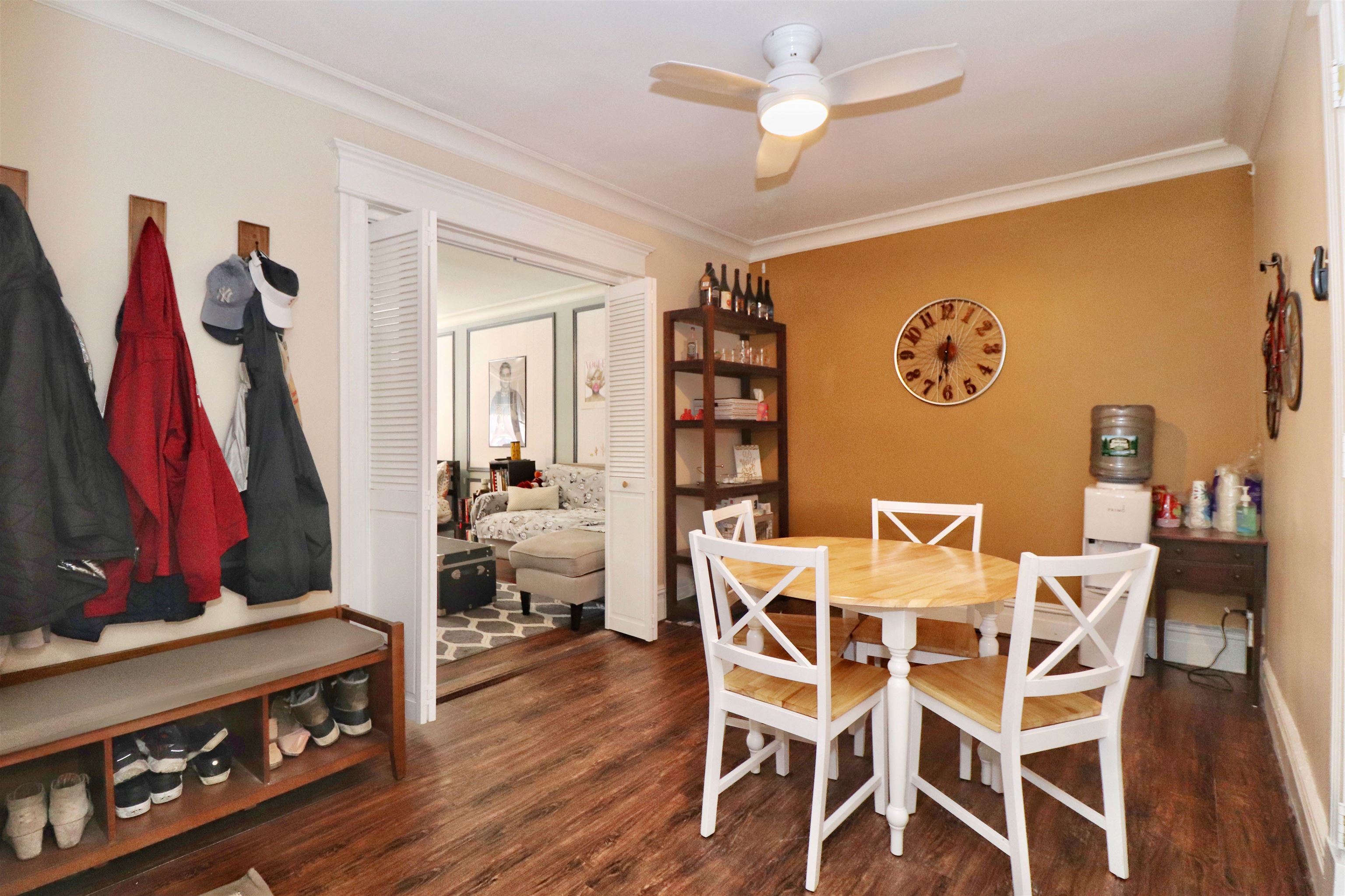 704 Washington Street, Unit 2 Hoboken, NJ 07030 - Photo 11 of 23 a view of a dining room with furniture and wooden floor
