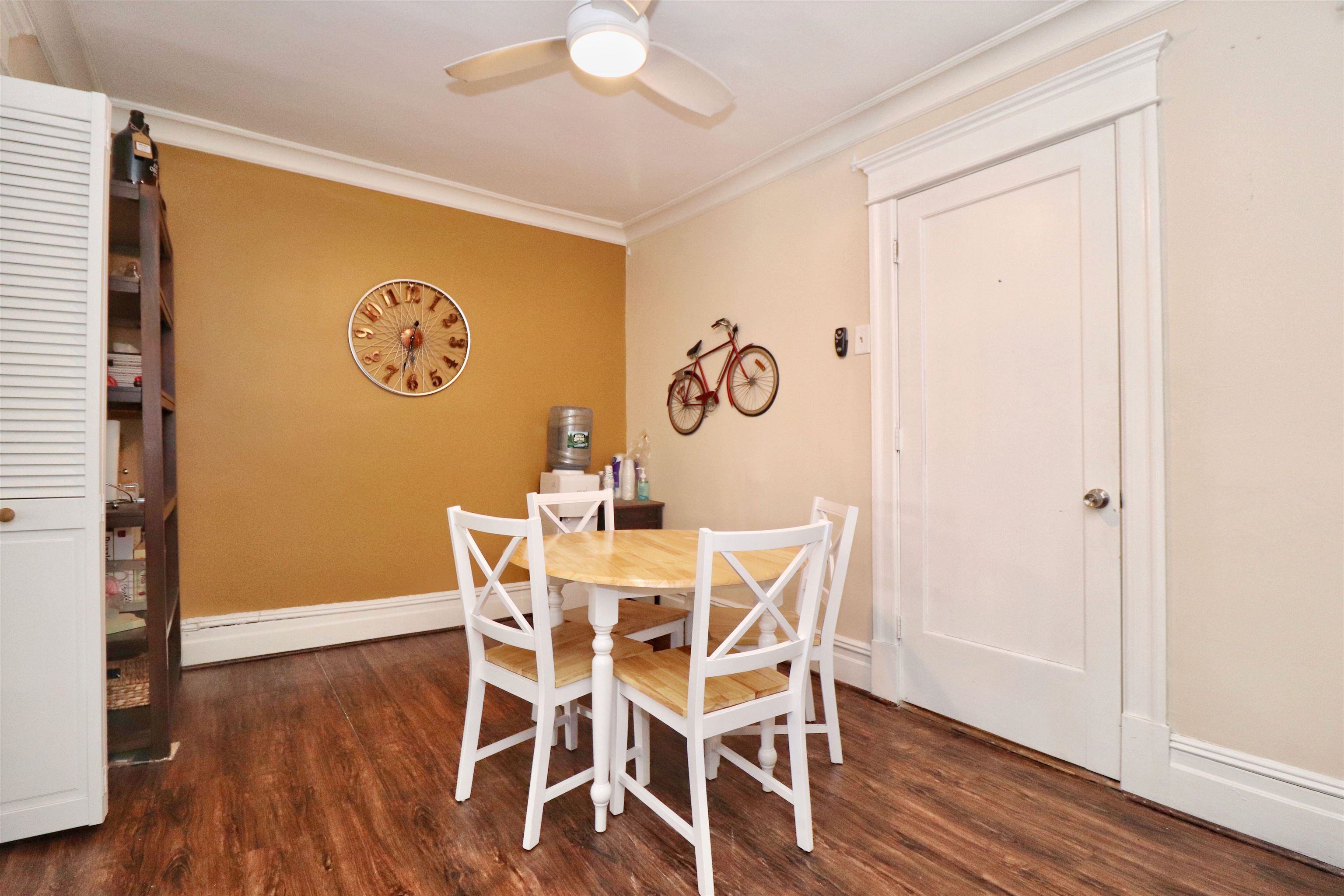 704 Washington Street, Unit 2 Hoboken, NJ 07030 - Photo 12 of 23 a view of a dining room with furniture and wooden floor