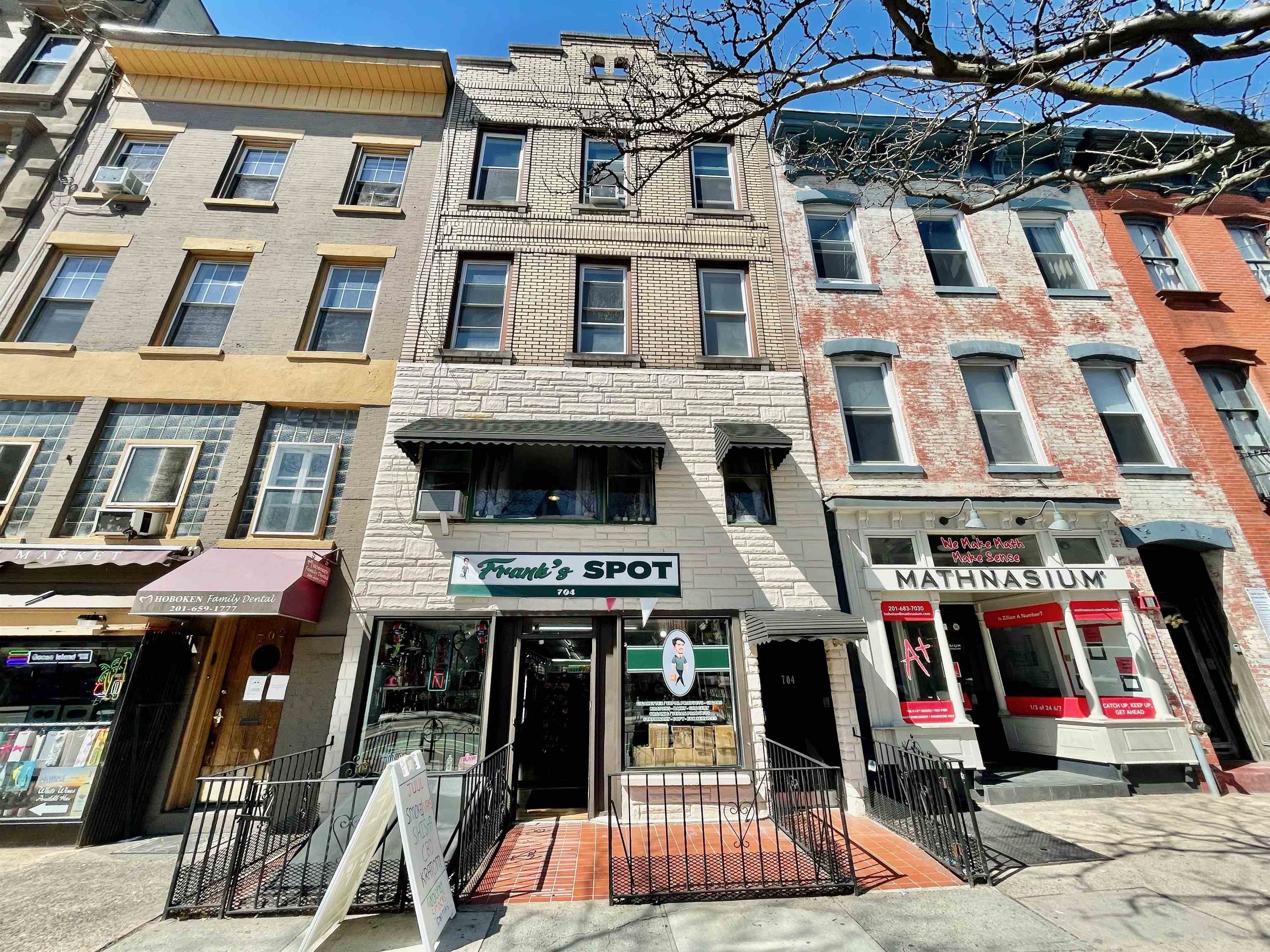 704 Washington Street, Unit 2 Hoboken, NJ 07030 - Photo 21 of 23 a view of a building with many windows