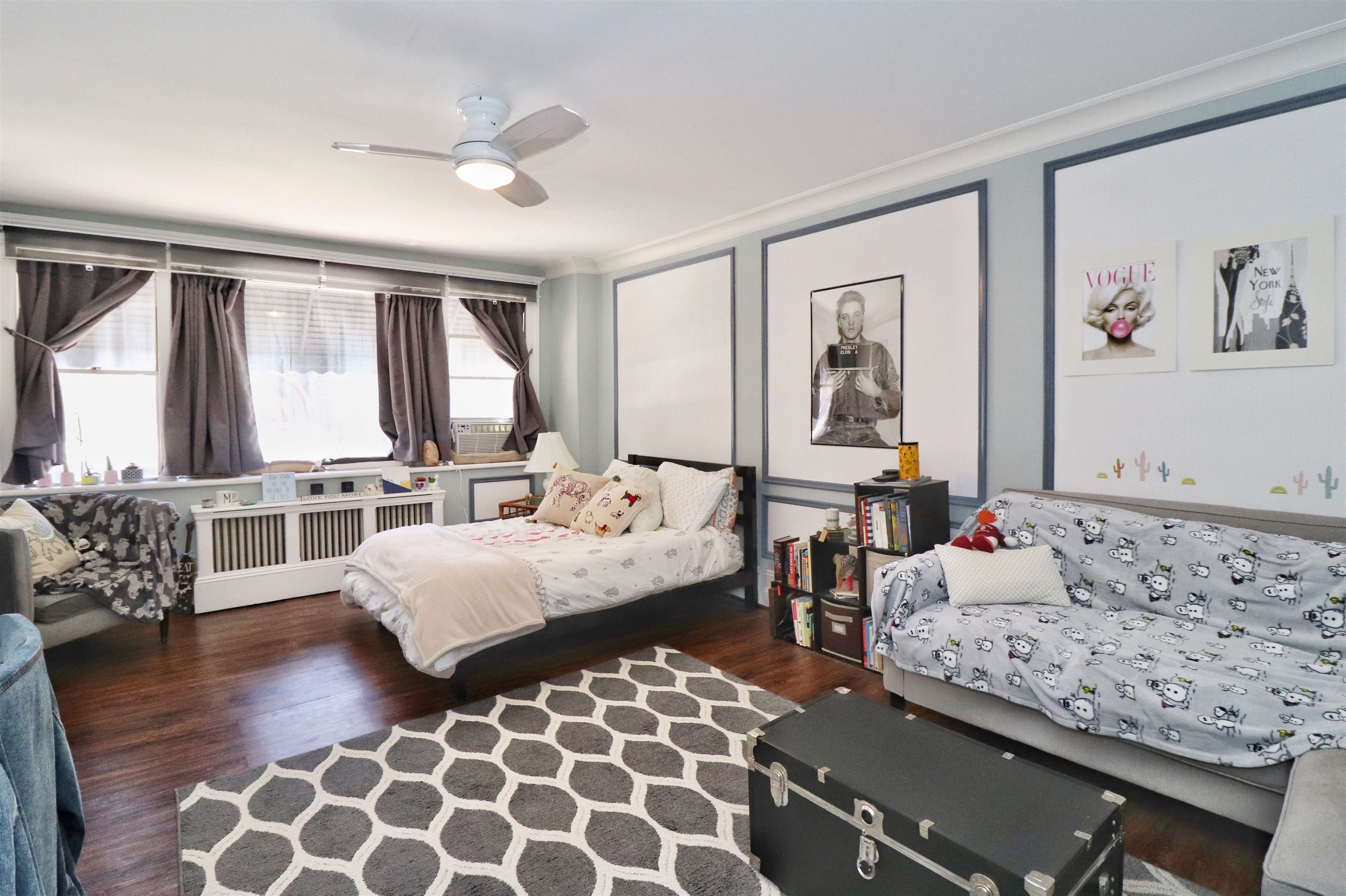 704 Washington Street, Unit 2 Hoboken, NJ 07030 - Photo 4 of 23 a bedroom with furniture and wooden floor