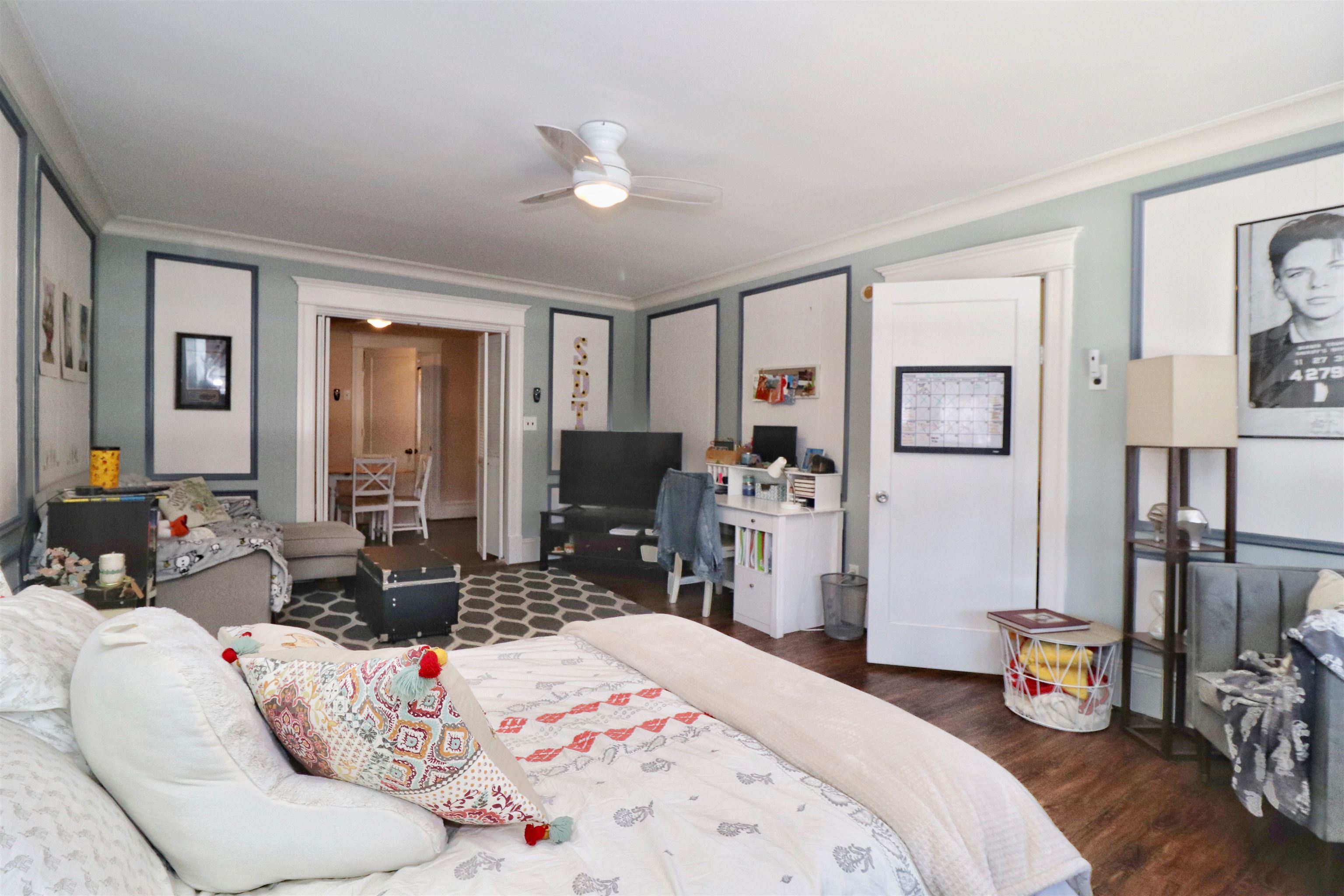704 Washington Street, Unit 2 Hoboken, NJ 07030 - Photo 7 of 23 a bedroom with a bed a couch and dresser