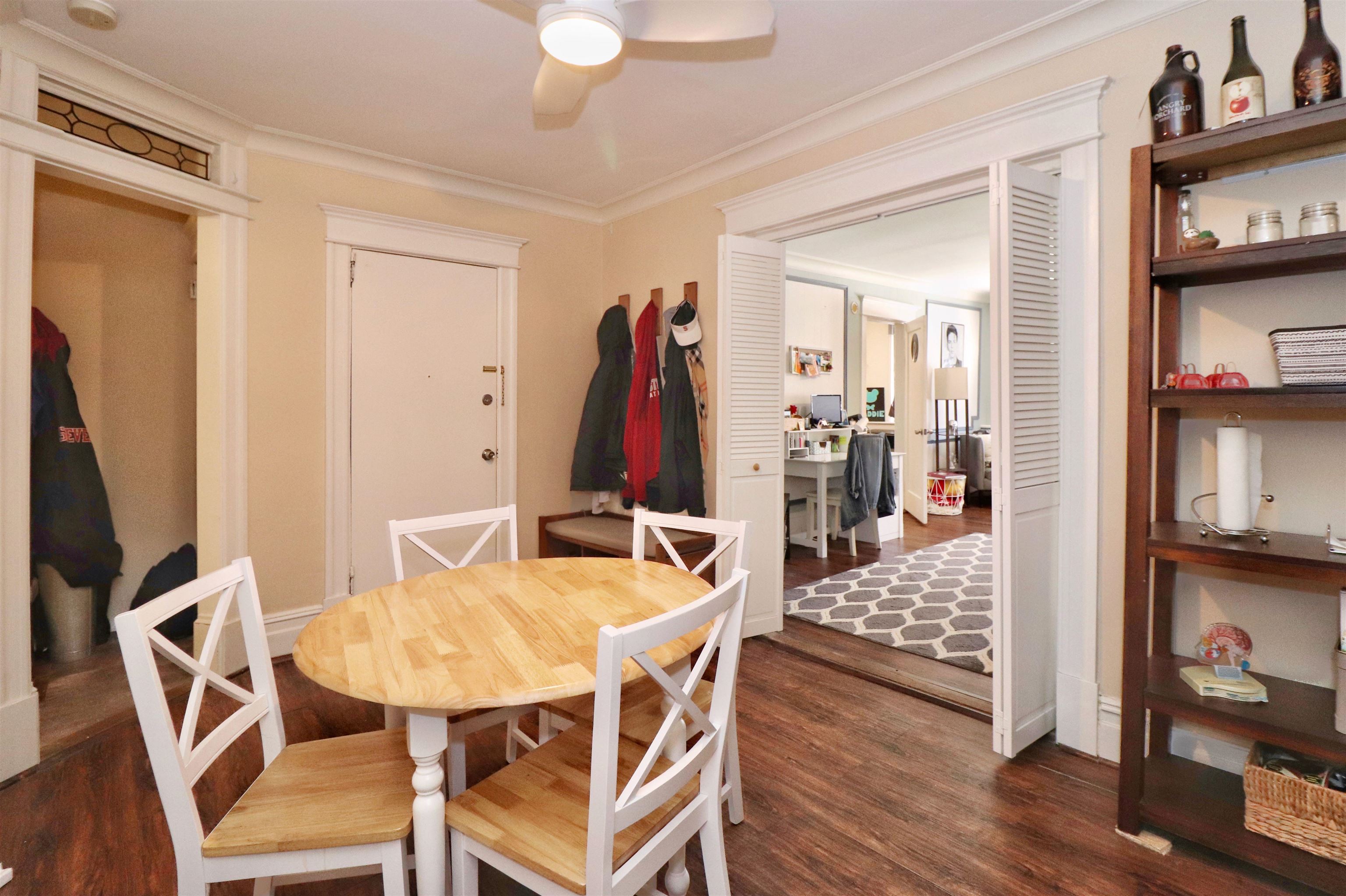 704 Washington Street, Unit 2 Hoboken, NJ 07030 - Photo 10 of 23 a view of a dining room with furniture and wooden floor