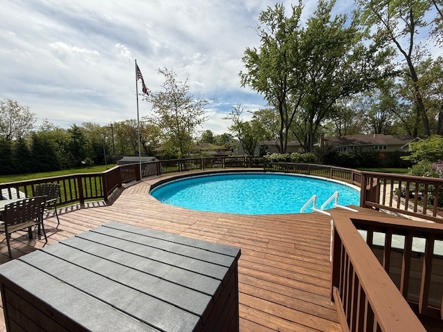 1201 East Street Crete, IL 60417 - Photo 13 of 45 a view of a swimming pool with a deck