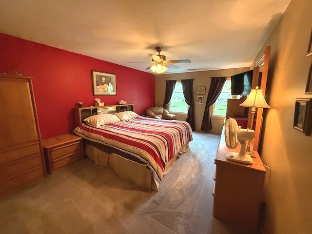 1201 East Street Crete, IL 60417 - Photo 28 of 45 a bedroom with a bed and wooden floor