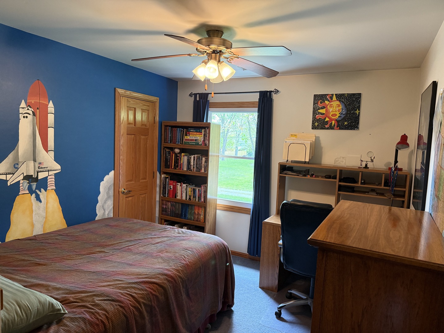 1201 East Street Crete, IL 60417 - Photo 39 of 45 a bedroom with a bed and a flat screen tv